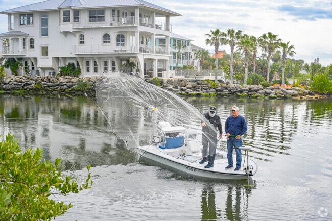 Cast a net into the river and catch a fish or two in Mosquito Lagoon on the Indian River.