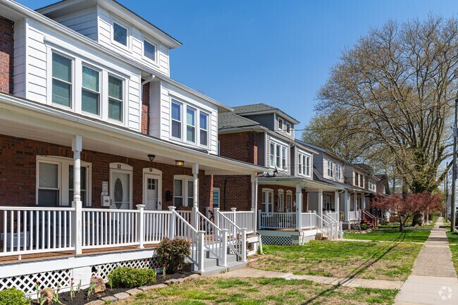 Four square Colonial homes fill the streets at the center of Claymont, many with front porches.