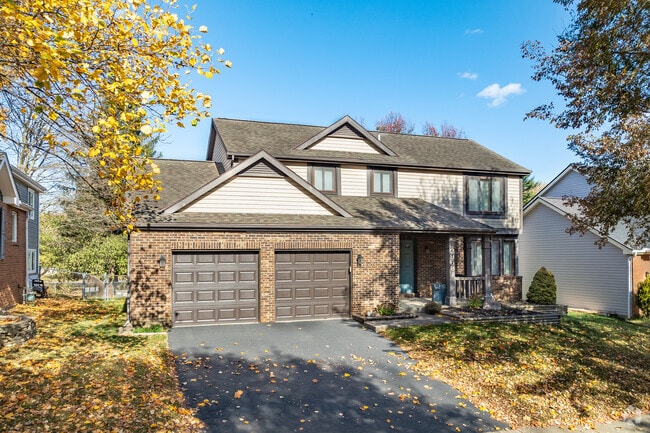 A two-story home in Northern Woods features an attached two-car garage.