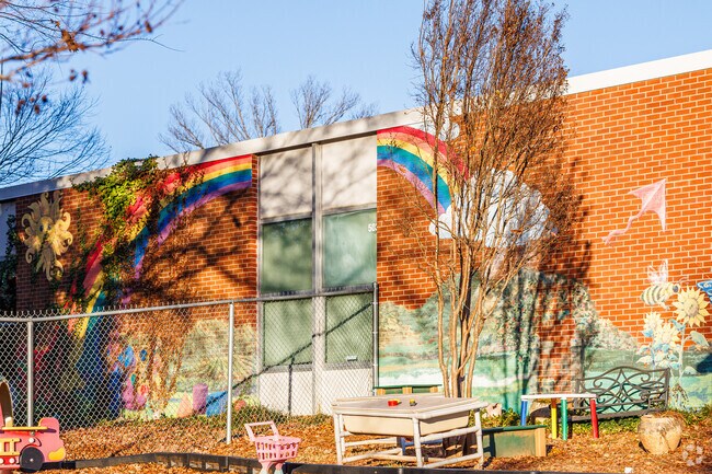 Cook Literacy Model School is adorned with colorful murals.