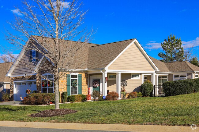 Landscaping adds curb appeal to suburban homes in Gibsonville.