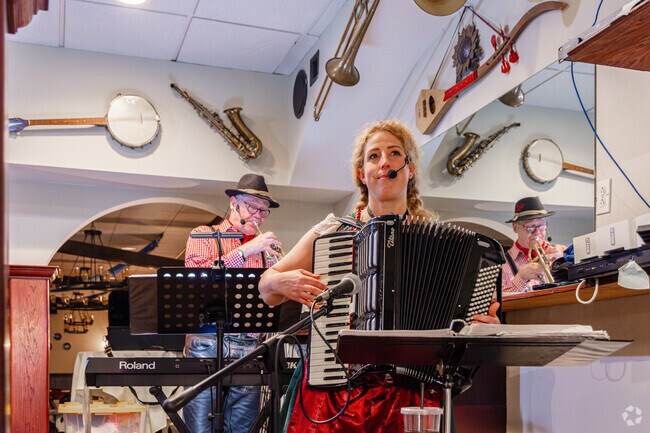 Catch local musicians like Alpine Thunder playing at Edelweiss in Irving Woods.