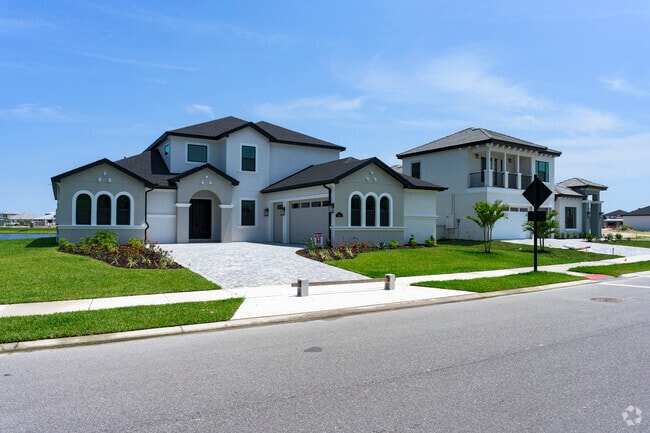 This newly constructed, well-appointed home in Viera West features a stylish paver driveway and modern finishes throughout.