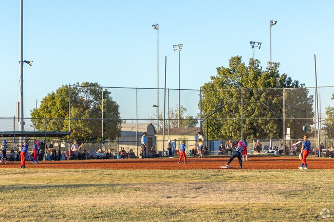Families often enjoy baseball tournaments for kids at Mitch Park in Edmond.
