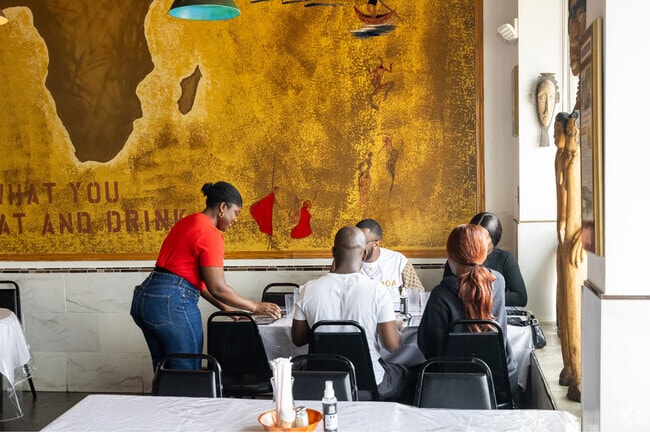 Stateway Gardens residents enjoy African dishes at Yassa.