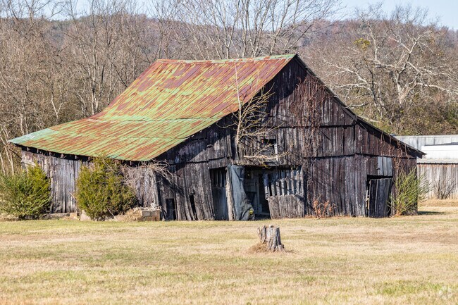 Kittrell is adorned with picturesque barns that add to its charm.