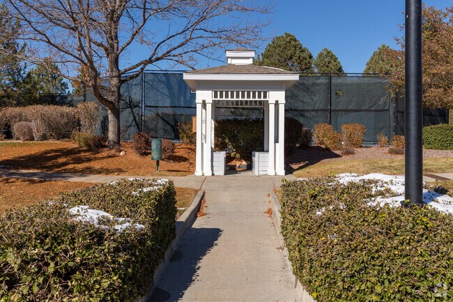 At Greenfield's Swim & Tennis Club, residents have access to tennis courts & a covered benches.