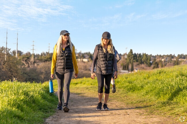 Locals are enjoying a scenic walk on Hidden Lakes Park trail in Alhambra Hills.