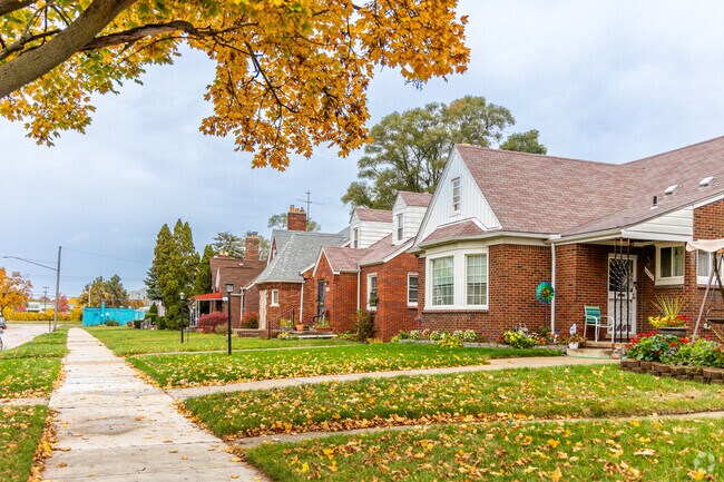A row of brick single family homes in the Hubbell-Puritan neighborhood.