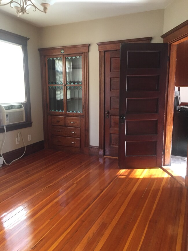 Dining room with built-in hutch and storage closet