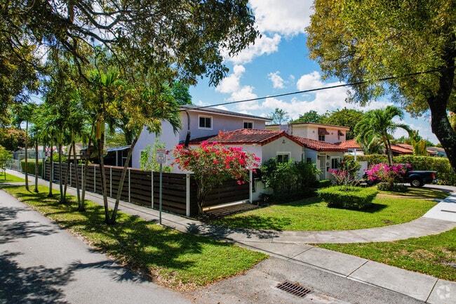 Flagler homes have beautiful front yards with colorful flowers.