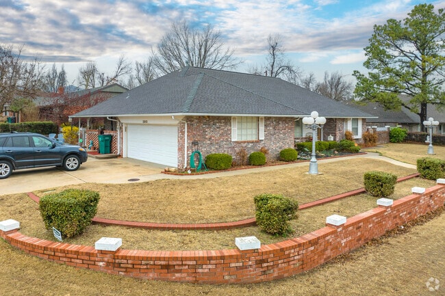 Antique lamp posts reside in the front yards of mid-century homes in the town of Windsor Hills.
