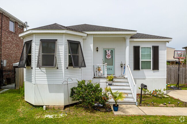Many homes in New Metairie North have storm shutters to prevent damage during hurricane season.