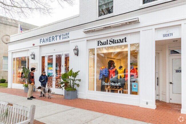 Residents window shopping one of the many storefronts in downtown Southampton.