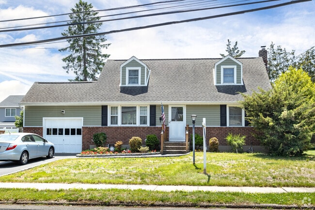 There are many modern Cape Cods in East Farmingdale, NY, many with attached garages.