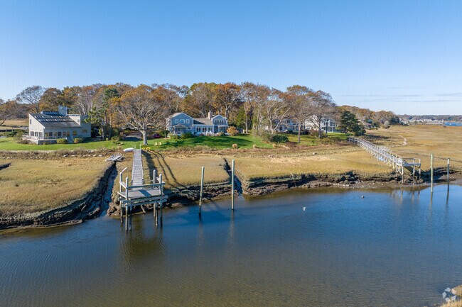 Step out your back door and onto your private dock in Marshfield Hills.