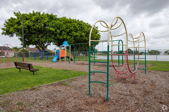 Country Wood Park comes with a playground and lake views.