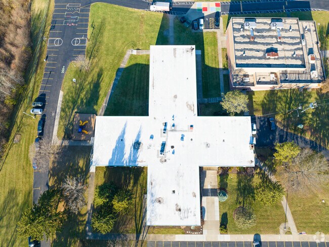 The John Paul II Catholic School has a unique cross architectural design.