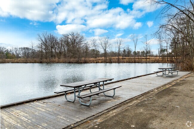 Schrock Lake near Park Club is a beautiful fishing lake with plenty of picnic tables around it.