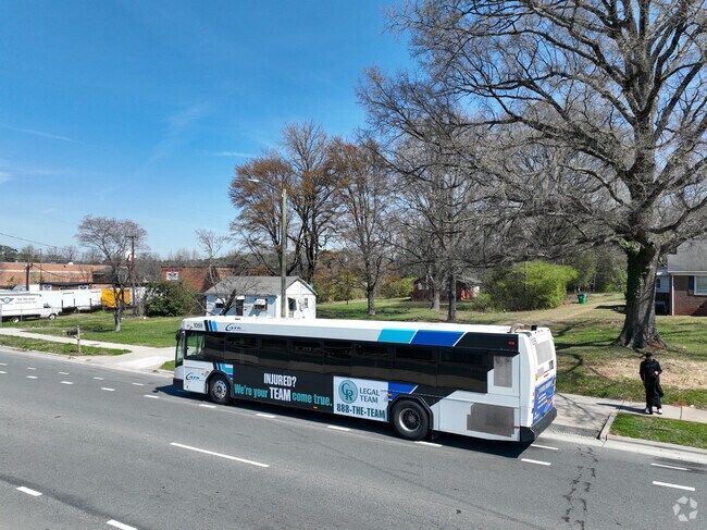 There are multiple bus stops in the Sunset Rd.