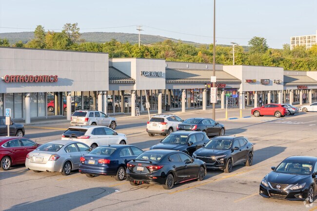 Retail plazas line Plank Road a few miles south of Juniata Gap.