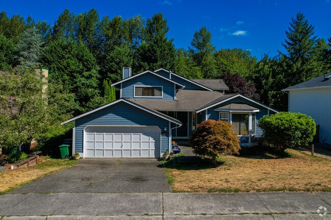 Craftsman-style homes in Cedar River often include garages.