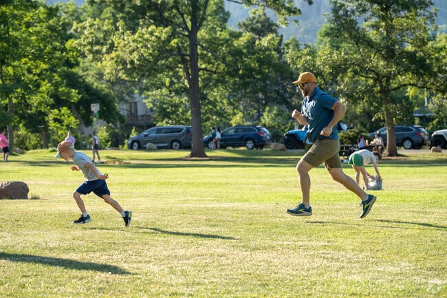 Run through field with your children at Chautauqua Park and a beautiful summer afternoon.