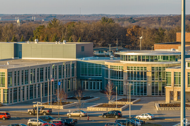Hudson High School is surrounded by large trees just up the hill from the St. Croix River.