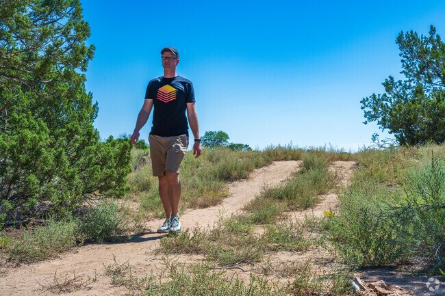 Nava Ade is known for the miles of trails that wind between its homes and parks.