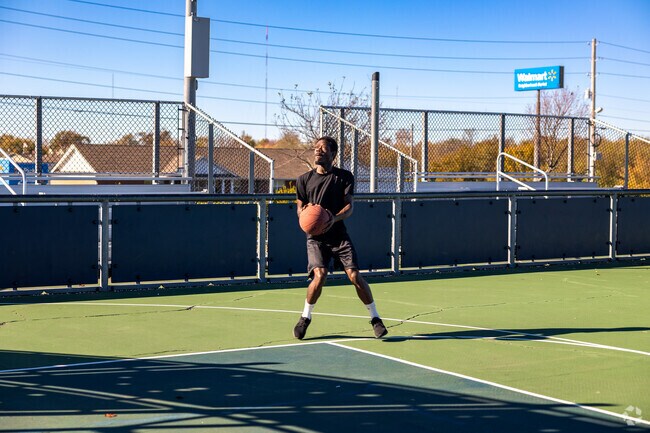 Practice your basketball skills at Cunningham Park's court.