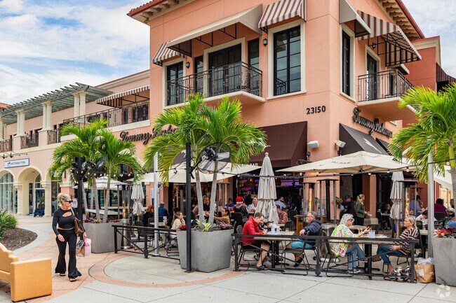 Tommy Bahama has a popular outdoor patio with live music near Grandezza.