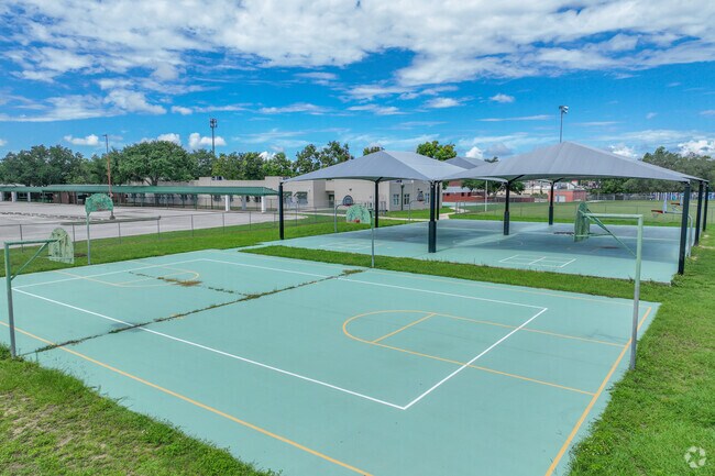 Temple Terrace Elementary School has outdoor shaded basketball courts for kids to play on.