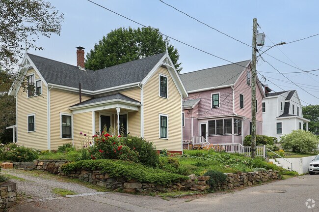 Homes in the West End are tightly spaced and many streets lack sidewalks, giving the area a more compact and somewhat informal streetscape.