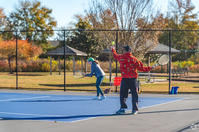 Locals can be found on the courts at Lynnhaven Park for a friendly tennis match.