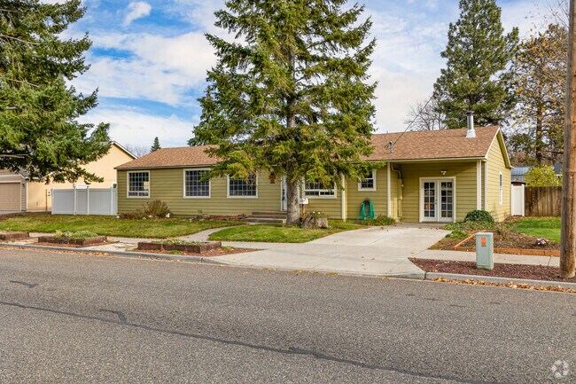 Dayton boasts cozy ranch-style homes nestled among evergreen trees.