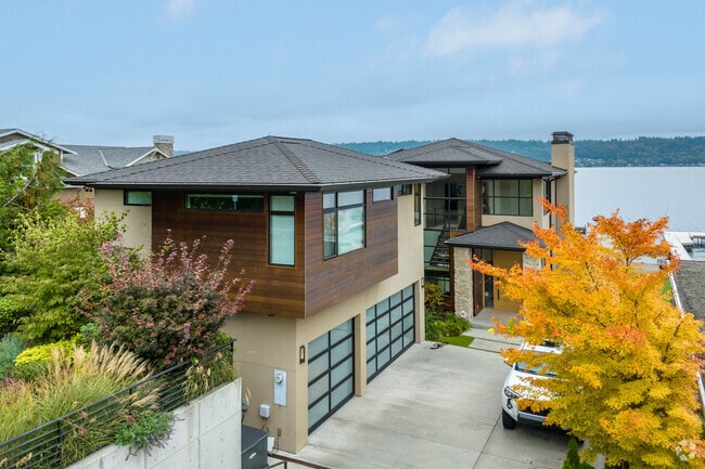 Some West Lake Sammamish residences sit steps from the lake’s sandy edge.