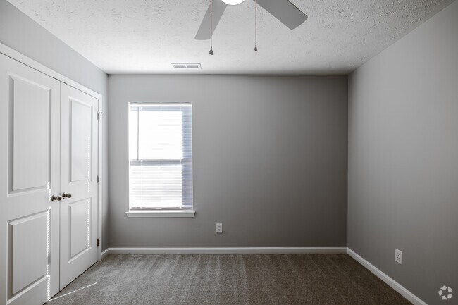 3BR, 2BA - 1,165SF Beedroom