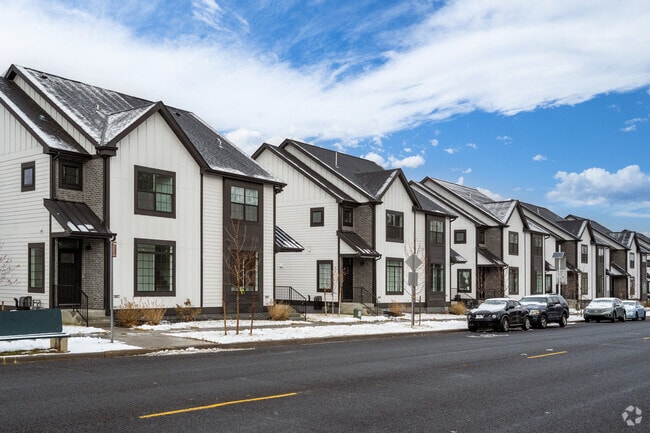 New, modern farmhouse condominiums near Laredo Highline in Aurora, Colorado.