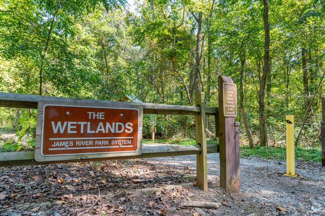 At the entrance of Wetlands Park, nature's wonders unfold, inviting you to explore Willow Oaks.