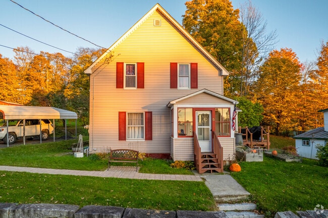 A worker's cottage in Graniteville catches the setting sun.