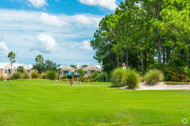 Enjoy putting greens and chipping greens and practice you swing at the PGA Golf Club.