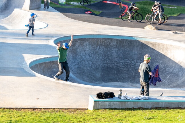 Children and adults enjoy the skate and bike park at Base Camp Skate Park.