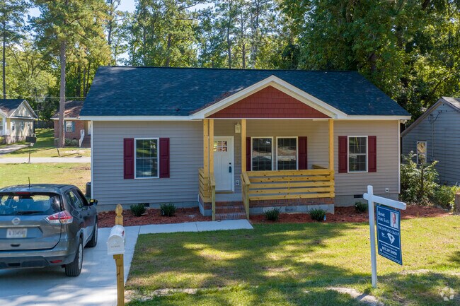 Newer bungalows in Belmont may feature vinyl siding over traditional brick.