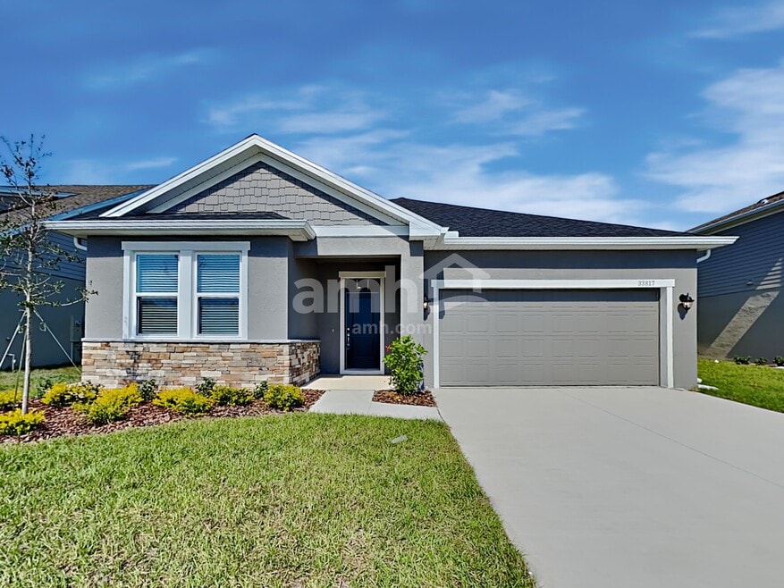 33817 Widman Way, Wesley Chapel, FL 33543 - photo 1