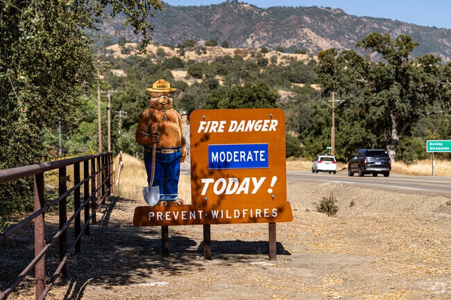 Smokey Bear warns Yokuts Valley of moderate fire danger amid dry foothill conditions.