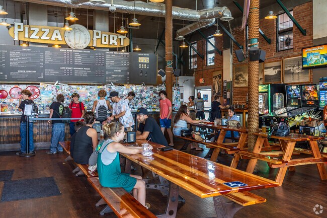 Hedionda Point residents enjoy the games and casual dining atmosphere at Pizza Port in Carlsbad Village.