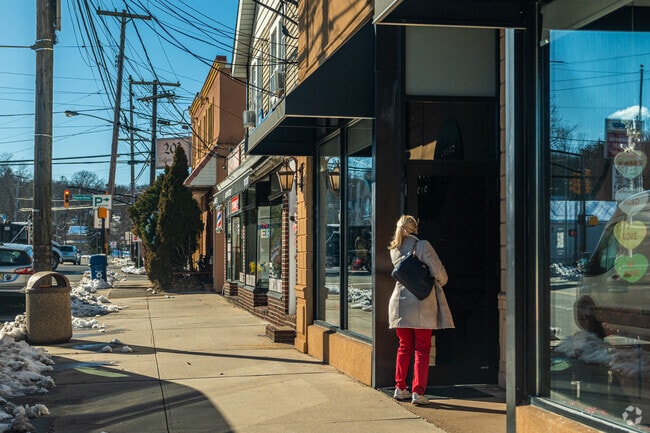 Stop by various stores in Lincoln Park's Main Street shopping area.