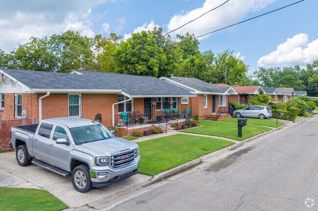 Plenty of four-sided brick homes offer a more traditional look.