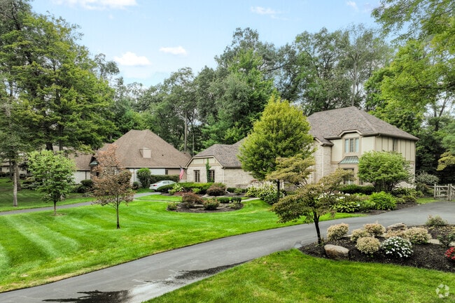 Two-story traditional homes with well-kept yards can be found in Franklin Park.