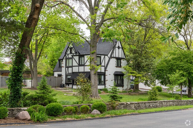 Large Tudors can be found hidden in the trees along the streets of Ladue.